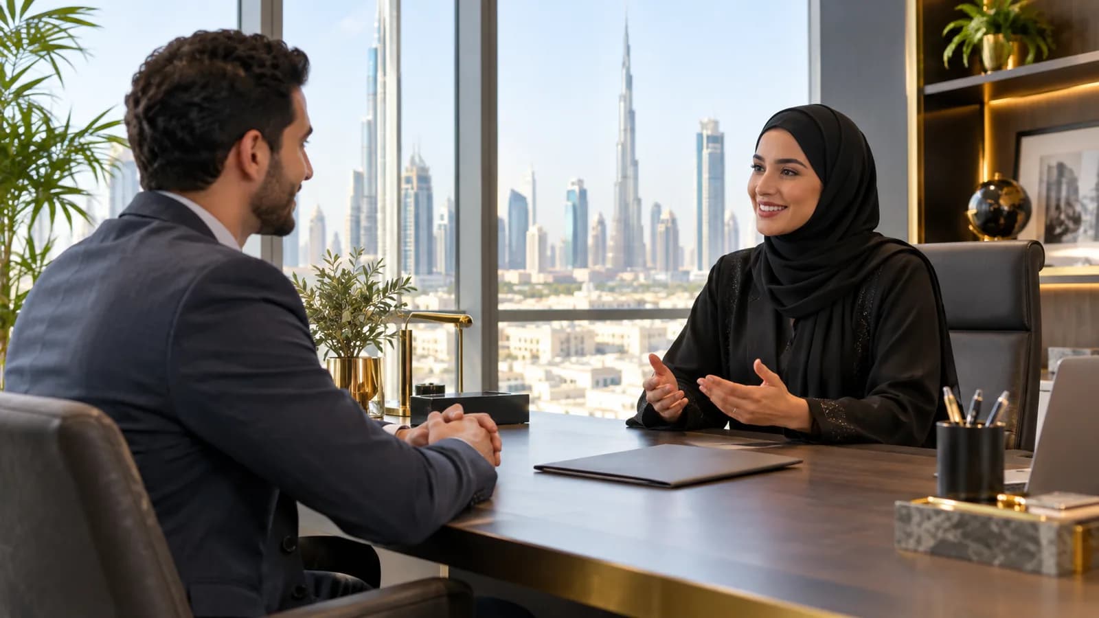 Professional discussing a new role with an HR representative in Dubai